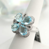 18k White Gold Blue Topaz and Diamond Flower Ring - Image 2