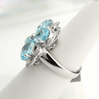 18k White Gold Blue Topaz and Diamond Flower Ring - Image 3