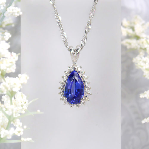 Pear Shaped Tanzanite and Diamond Halo Pendant in 14k