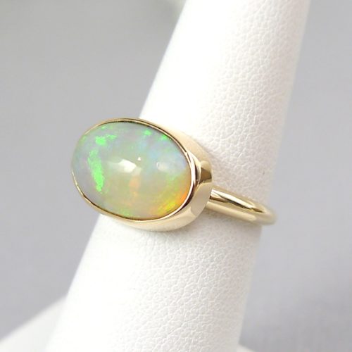 14k Handmade Bezel Ring with Oval Ethiopian Opal Cabochon in Yellow Gold