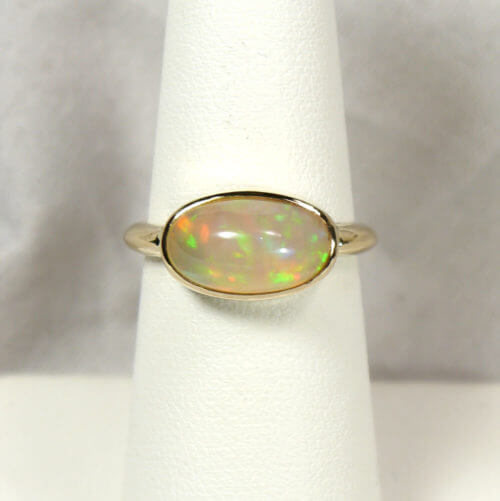 14k Handmade Bezel Ring with Oval Ethiopian Opal Cabochon in Yellow Gold