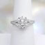 18k (1.44 ct) Emerald Cut Diamond and Diamond Halo Engagement Ring in White Gold