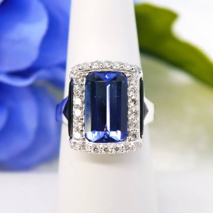 5.23ct Tanzanite, Onyx, and Diamond Halo Ring in 18k White Gold