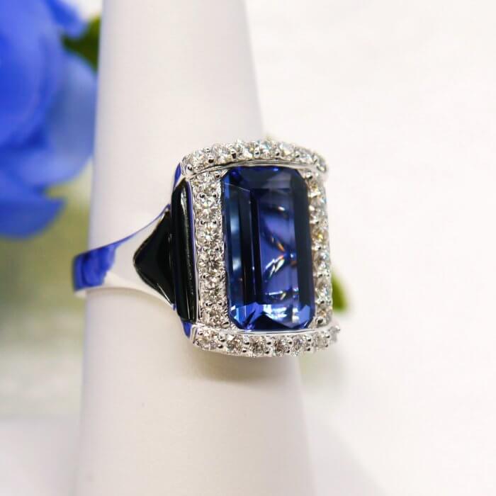 5.23ct Tanzanite, Onyx, and Diamond Halo Ring in 18k White Gold