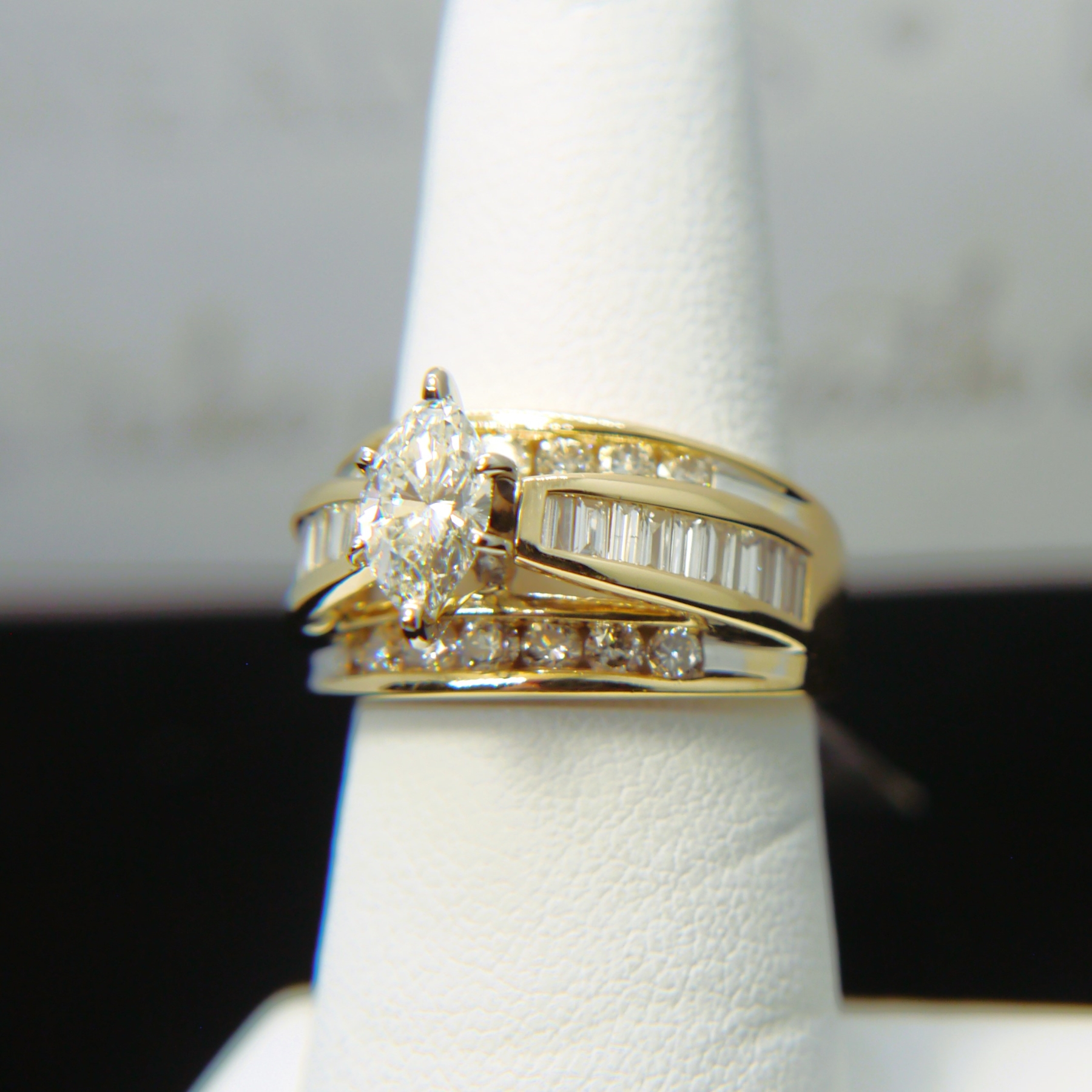 Three Row Style Marquise Center Engagement Ring in Yellow Gold