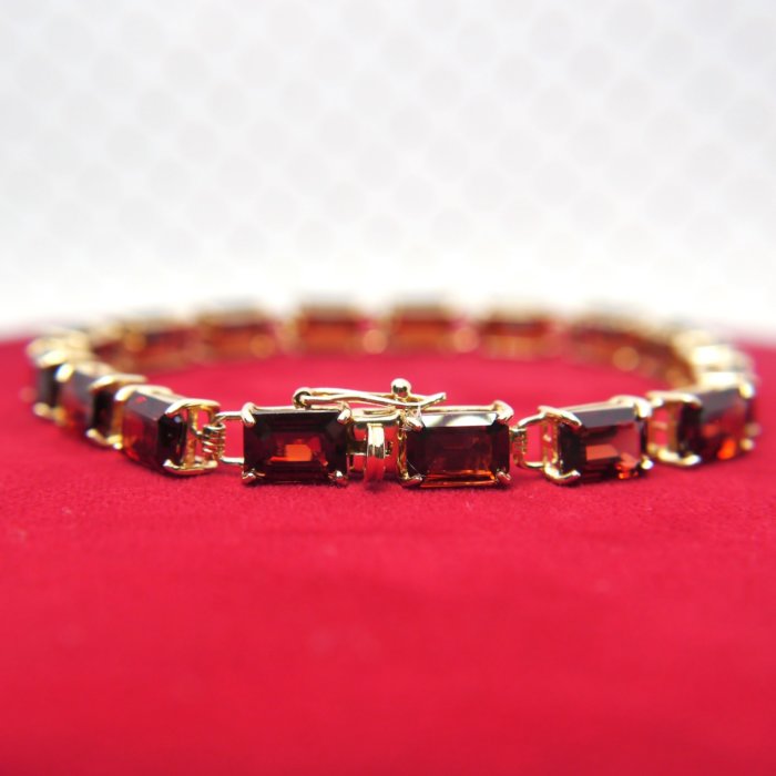 16.15ctw Emerald Cut Garnet Tennis Bracelet in 14k Yellow Gold