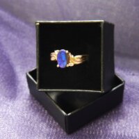 Black Oval Opal & Diamond Ring in 14k Yellow Gold