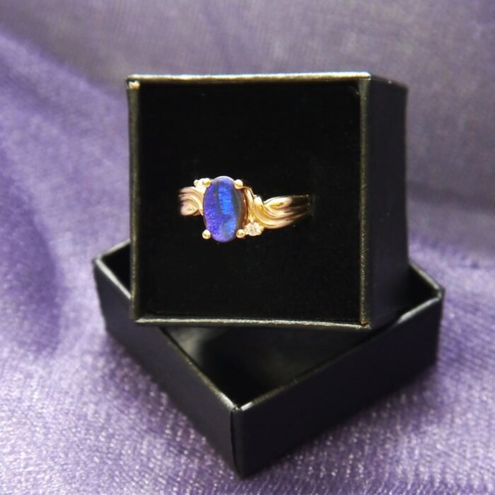 Black Oval Opal & Diamond Ring in 14k Yellow Gold