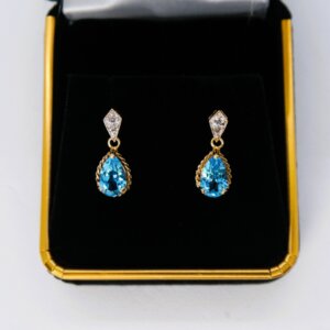 Pear Shaped Blue Topaz & Diamond Drop Post Earrings in 10k Yellow & White Gold - Image 3