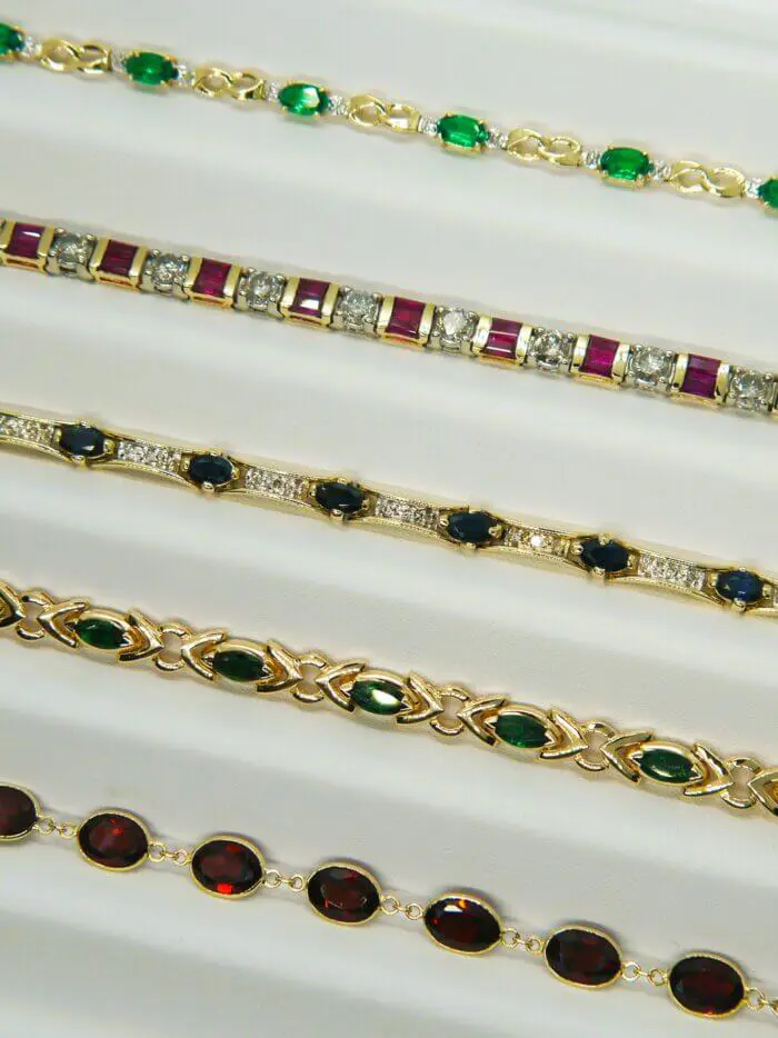 Synthetic Oval Emerald & Diamond Infinity Bracelet in 10k Yellow Gold - Image 3